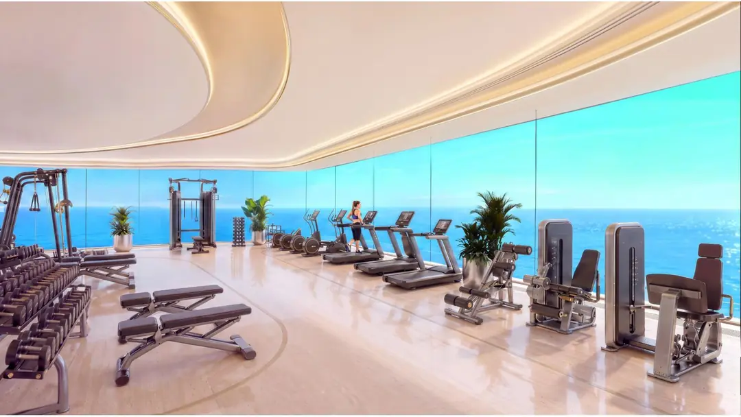 Indoor gym with sea view at Shahrukhz Residences